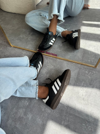 Ontari Black Samba Sneakers with White Stripes