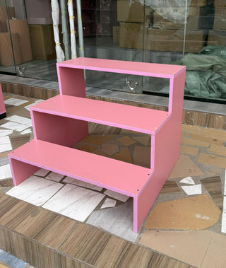 Rose pink three step shelve unit