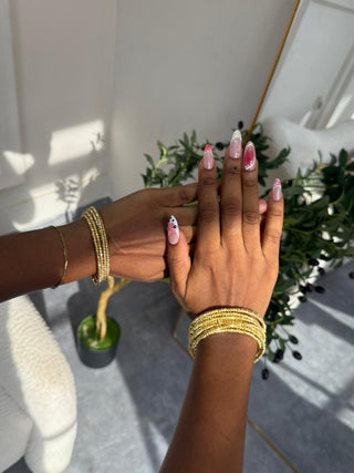 Esi bracelet and ring - Gold Coil